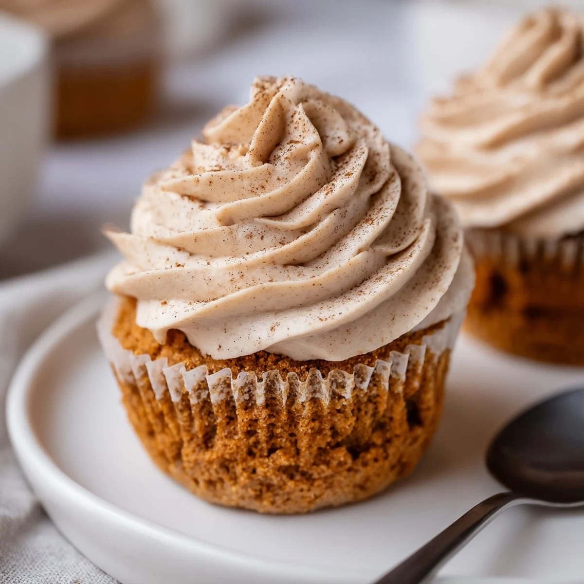 Deliciously fragrant pumpkin cupcakes, spiced perfectly for autumn gatherings and celebrations.  