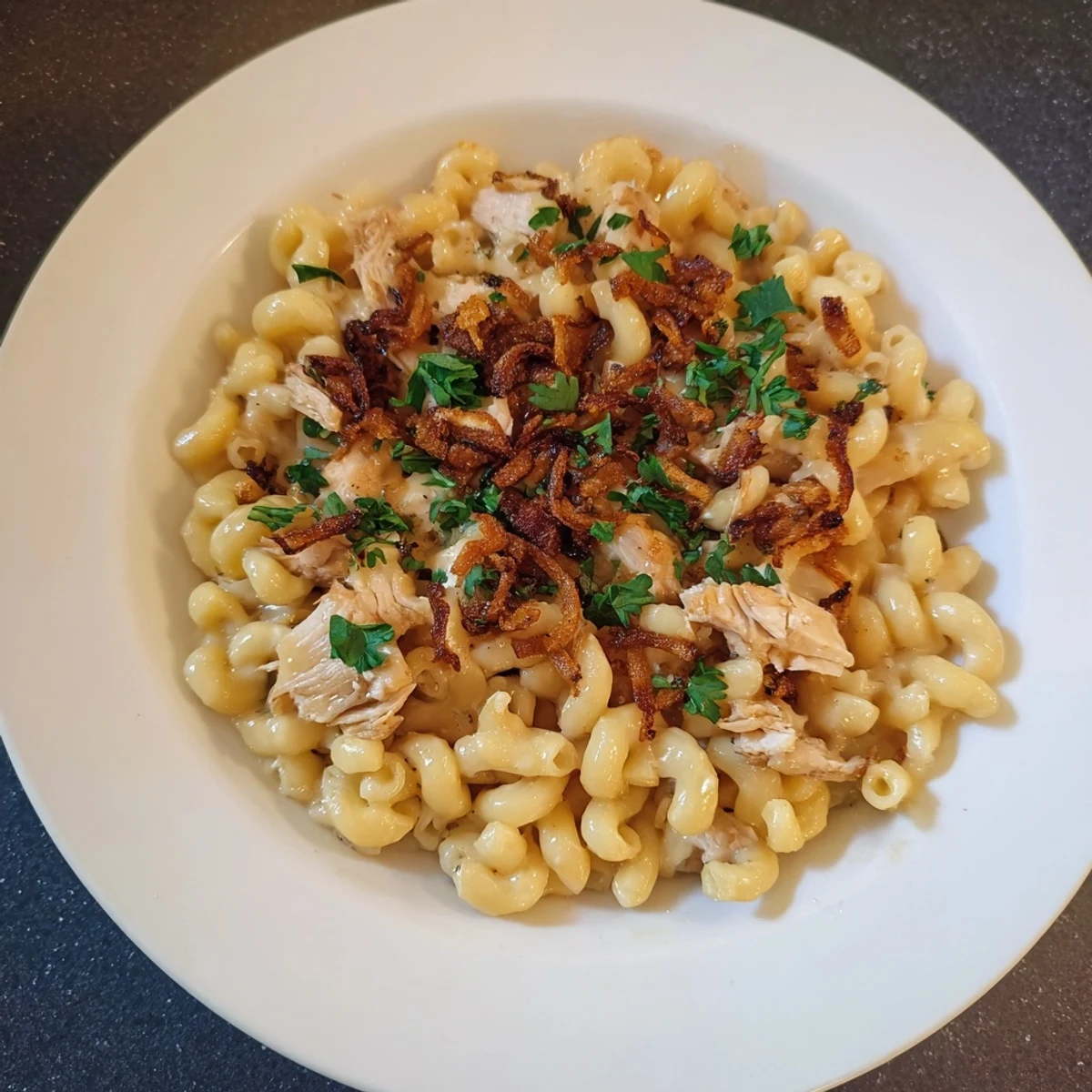 Golden, cheesy One-Pot Honey BBQ Chicken Mac and Cheese with a sweet, smoky BBQ aroma.