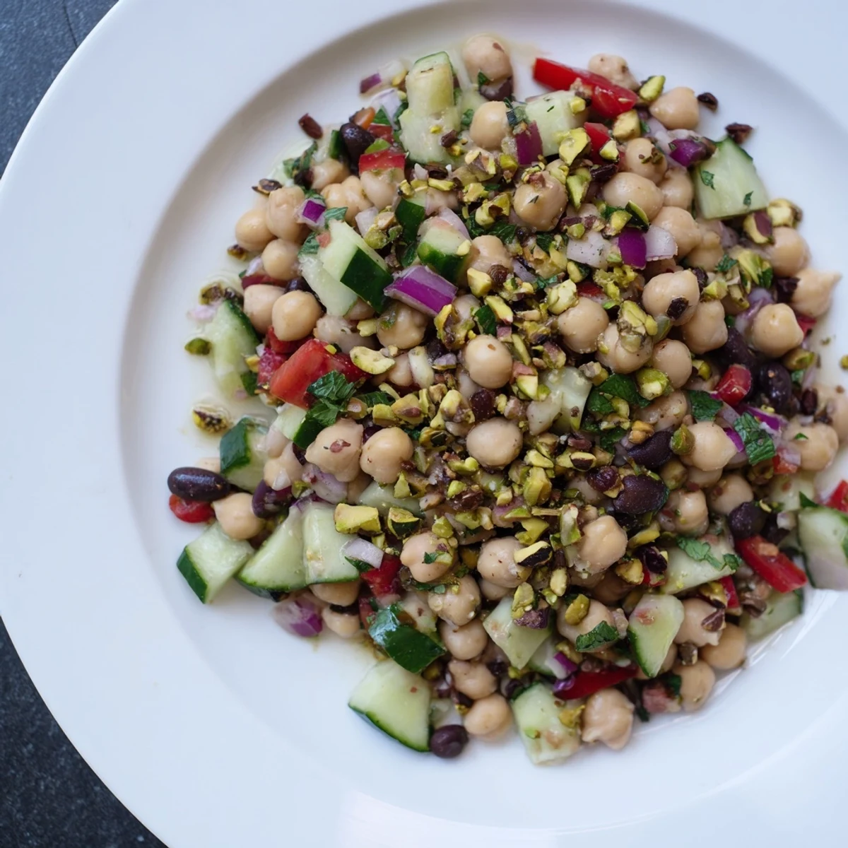 A vibrant bowl of Dense Bean Salad with Dubai Chocolate Notes, ready to serve and enjoy.