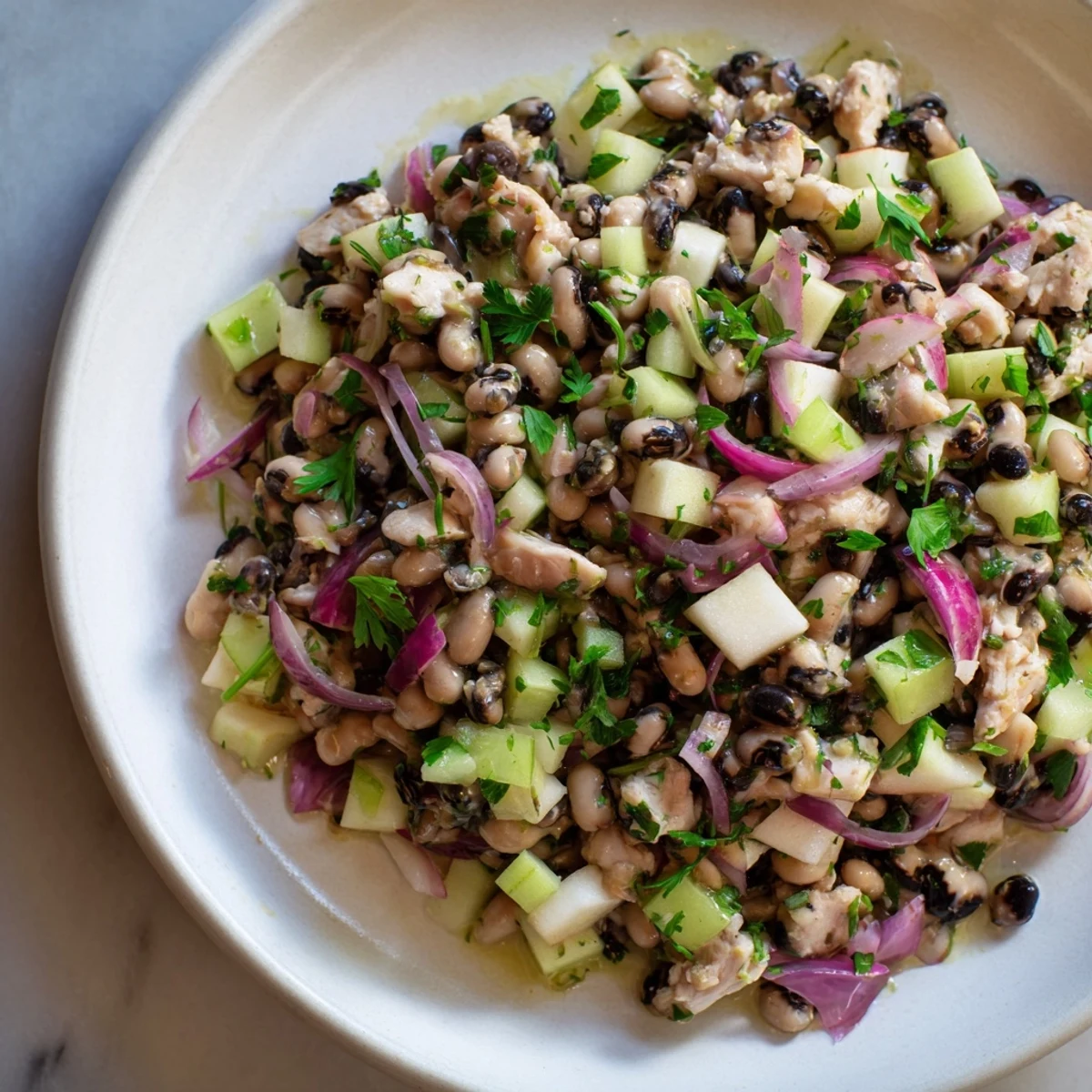 This gorgeous Chicken and Apple New Years Luck Salad has juicy chicken, crisp apples, and a tangy dressing.