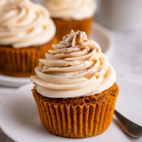 Moist spiced pumpkin latte cupcakes topped with rich espresso cream cheese frosting.  