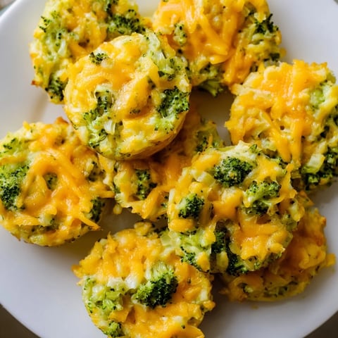 Golden-brown Cheesy Broccoli Casserole Bites, enticing aromas, perfect as a keto-friendly appetizer.