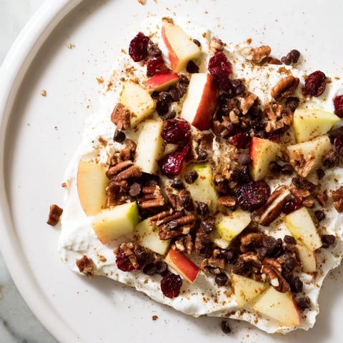 Frozen Apple Cinnamon Yogurt Bark, a refreshing snack with apple pieces and creamy yogurt.