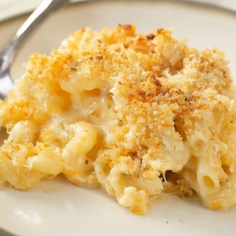 Comforting Baked Macaroni and Cheese, featuring rich cheese sauce and a crunchy panko topping.  