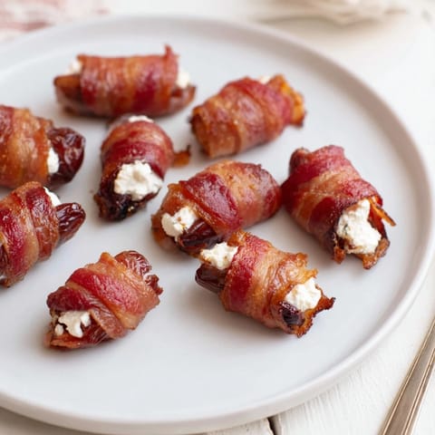 Golden bacon wraps create a savory counterpoint to the sweet goat cheese and delicious dates.
